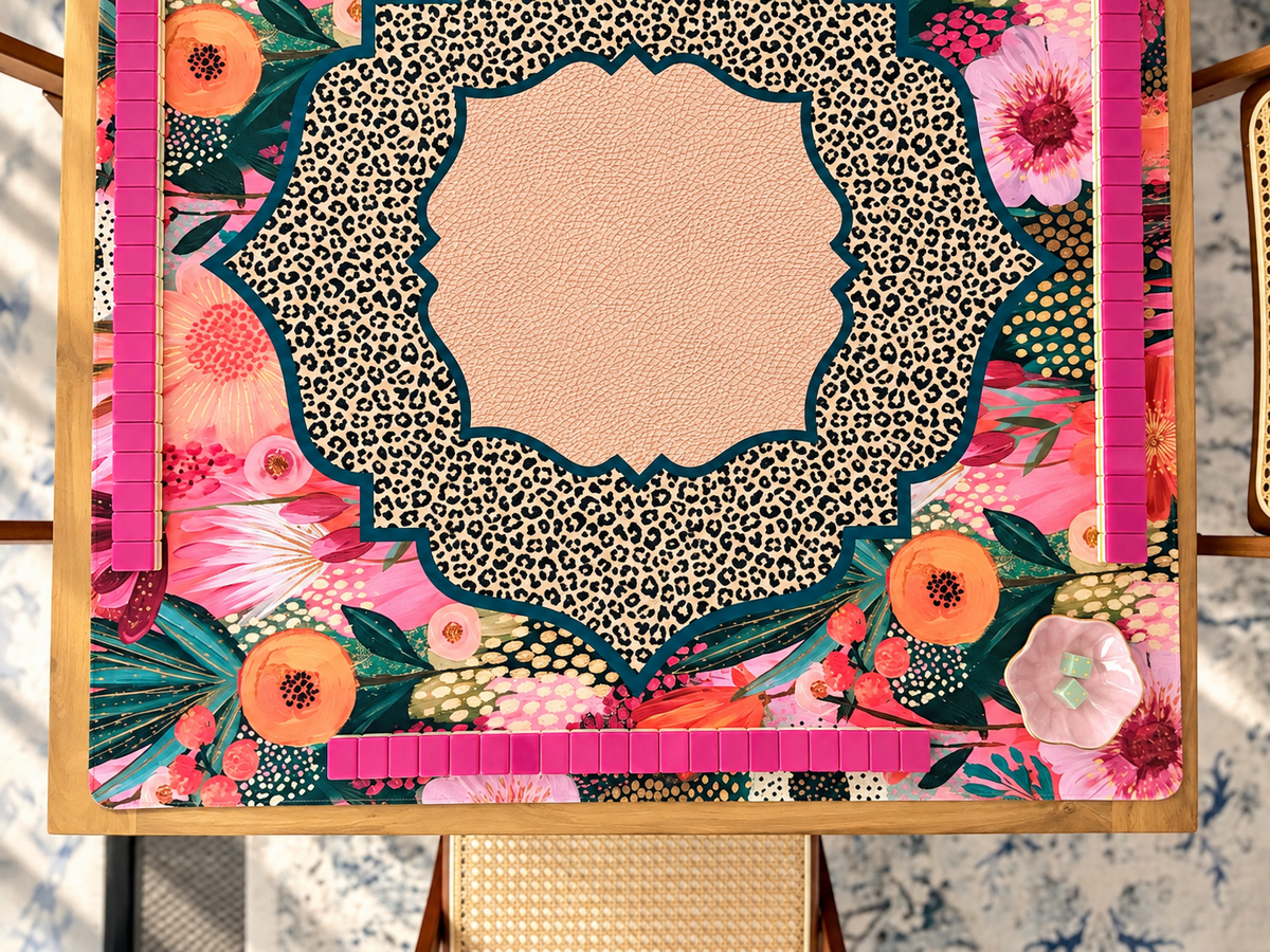 Bold floral and leopard mahjong mat with bright pink tiles